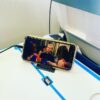 Standeazy phone stand black on an airplane